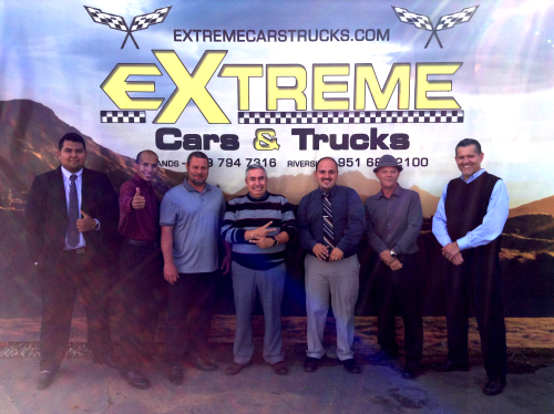 Group photo at extreme auto sales. Sales Department staff working at extreme auto sales.