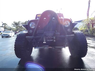 2015 Jeep Wrangler Unlimited Sport S   - Photo 4 - Naples, FL 34104