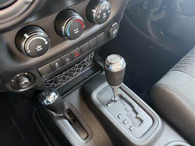 2012 Jeep Wrangler Sport 4X4 - Photo 16 - Flushing, MI 48433