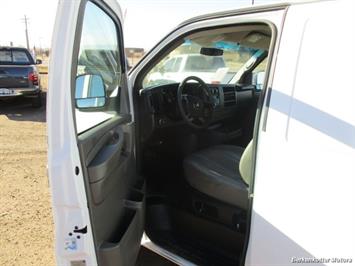 2014 Chevrolet Express 1500 AWD Cargo 4x4 - Photo 12 - Brighton, CO 80603