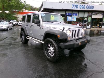 2014 Jeep Wrangler Unlimited Rubicon  WITH 4BRAND NEW TIRES - Photo 4 - Roswell, GA 30075