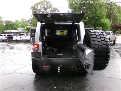 2014 Jeep Wrangler Unlimited Rubicon  WITH 4BRAND NEW TIRES - Photo 32 - Roswell, GA 30075