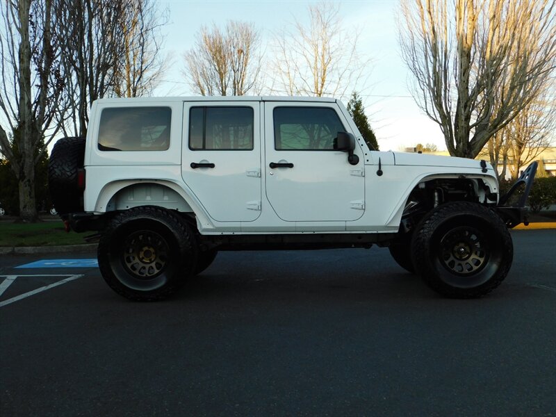 2014 Jeep Wrangler Unlimited Sahara / 4X4 / Leather / CUSTOM LIFTED   - Photo 4 - Portland, OR 97217
