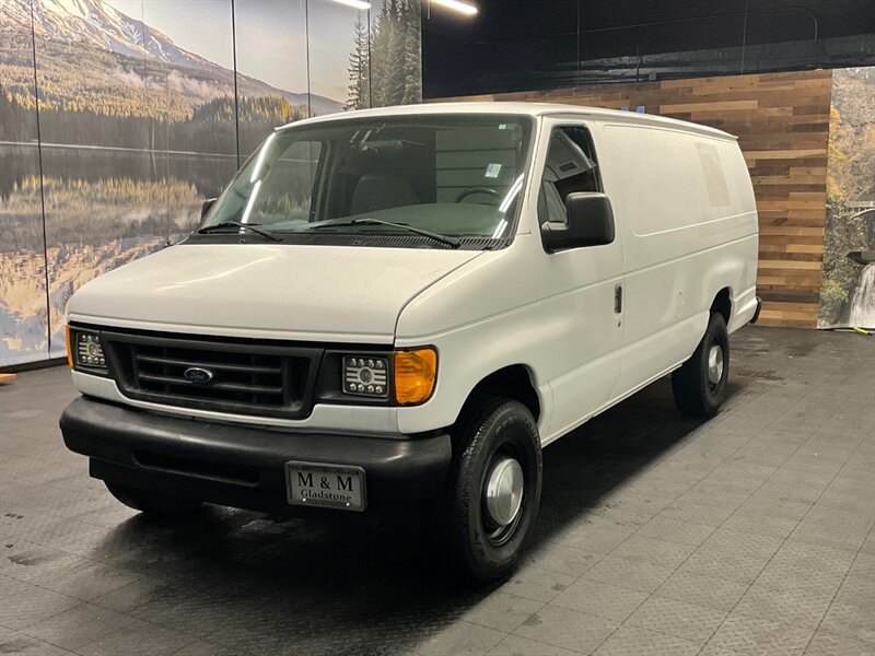 2003 Ford E-Series Van E-350 Super Duty EXTENDED CARGO VAN / 7.3L DIESEL  1-TON / 7.3L DIESEL / EXTENDED CARGO / BACKUP CAMERA / RUST FREE / CLEAN - Photo 1 - Gladstone, OR 97027