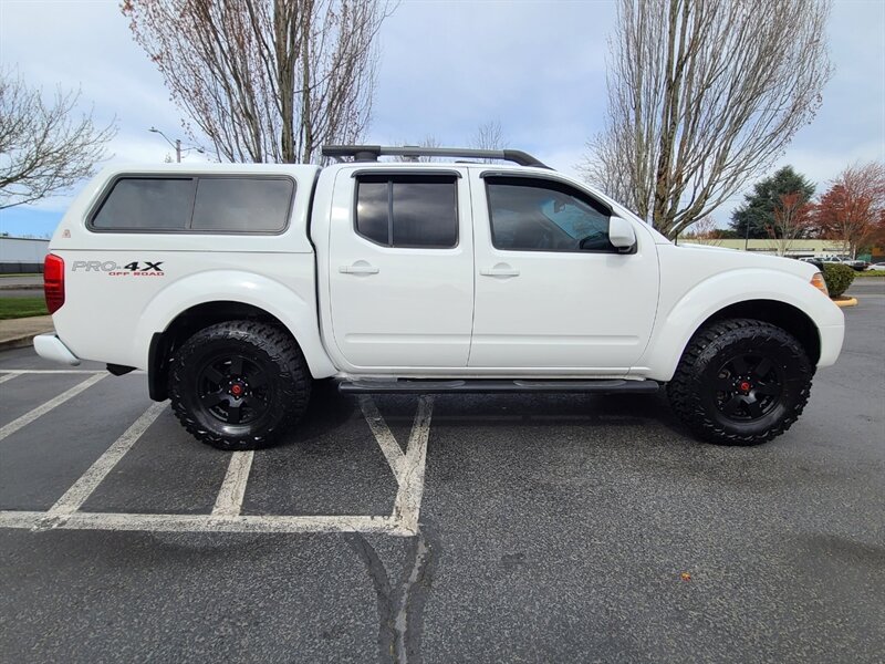 2011 Nissan Frontier PRO-4X / 4X4 / CREW CAB / V6 4.0 L / NEW TIRES  / SUNROOF / HEATED LEATHER / CANOPY / LOW 90K MILES !! - Photo 4 - Portland, OR 97217