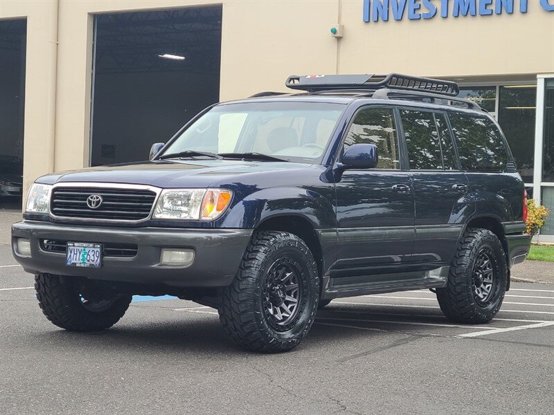2000 Toyota Land Cruiser 4X4 V8 / 8-PASSENGER / NEW FUEL WHEELS / NEW TIRES  / TIMING BELT + WATER PUMP SERVICE DONE RECENTLY / 1-OWNER - Photo 1 - Portland, OR 97217