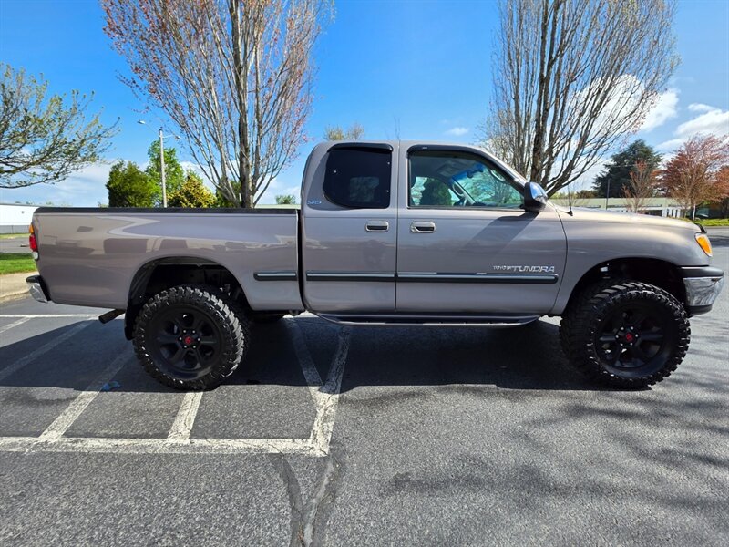 2000 Toyota Tundra SR5 V8 4X4 / TIMING BELT + WATER PUMP /LIFT KIT  / MUD TIRES / SPC CONTROL ARMS / LEATHER / 160K MILES - Photo 4 - Portland, OR 97217
