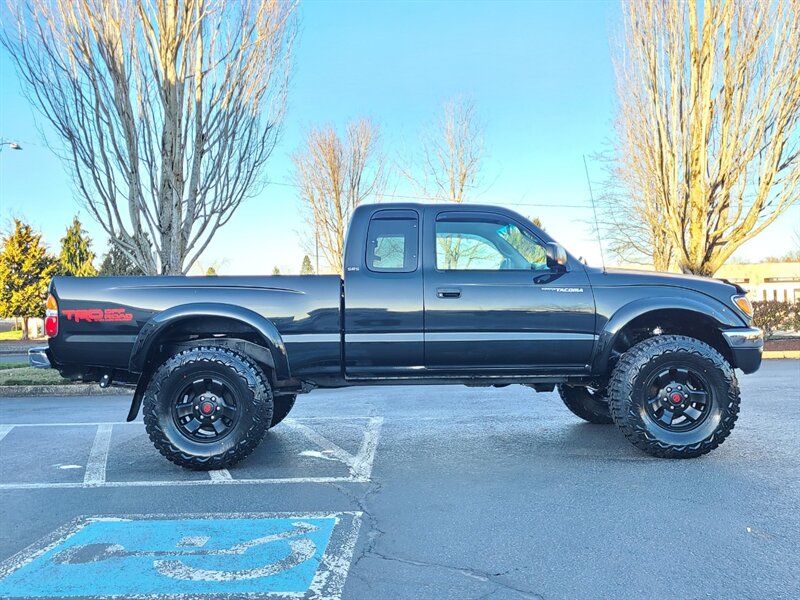 2004 Toyota Tacoma 4X4 V6 TRD OFF ROAD 5-SPEED / TIMING BELT / LIFTED  / NEW TIRES / MANUAL / REAR DIFF LOCK / 1-OWNER - Photo 4 - Portland, OR 97217