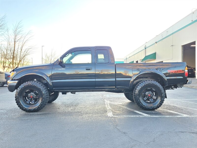 2004 Toyota Tacoma 4X4 V6 TRD OFF ROAD 5-SPEED / TIMING BELT / LIFTED  / NEW TIRES / MANUAL / REAR DIFF LOCK / 1-OWNER - Photo 3 - Portland, OR 97217