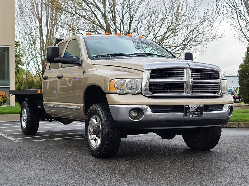 2004 Dodge Ram 2500 FLAT BED 4X4 / 5.9 L DIESEL / LONG BED / 6 SPEED  / LARAMIE / LEATHER / High Output CUMMINS / MANUAL TRANSMISSION - Photo 2 - Portland, OR 97217