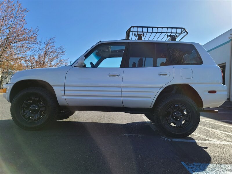 1999 Toyota RAV4 4X4 / Automatic / SUN ROOF / LEATHER SEATS /  / BRAND NEW TIMING BELT & WATER PUMP / NEW TIRES / NEW LIFT !!! - Photo 3 - Portland, OR 97217