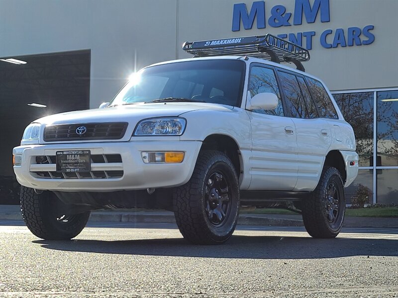 1999 Toyota RAV4 4X4 / Automatic / SUN ROOF / LEATHER SEATS /  / BRAND NEW TIMING BELT & WATER PUMP / NEW TIRES / NEW LIFT !!! - Photo 1 - Portland, OR 97217