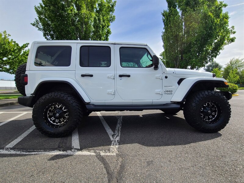 2019 Jeep Wrangler Unlimited SAHARA 4X4 V6 / LIFTED / 36K MILES  / 3.6L / HARD TOP / FUEL WHEELS / MUD TIRES / NO RUST / FACTORY WARRANTY / LOW LOW MILES - Photo 4 - Portland, OR 97217