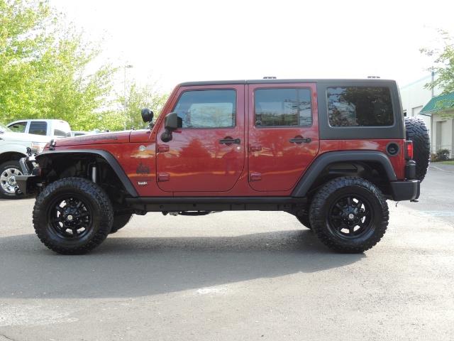 2011 Jeep Wrangler Unlimited Sport / 4X4 / 6-SPEED / LIFTED   - Photo 3 - Portland, OR 97217
