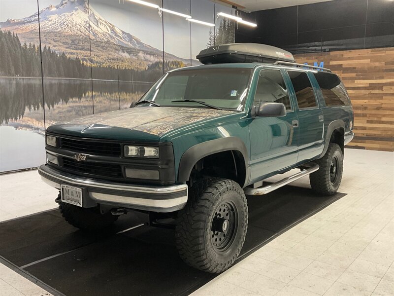 1997 Chevrolet Suburban 4dr K2500 4WD SUV / 3RD ROW SEAT / LIFTED  / 454 , 7.4L V8 , 3/4 TON / LIFTED w. 35 " TOYO MUD TIRES / 142,000 MILES - Photo 1 - Gladstone, OR 97027