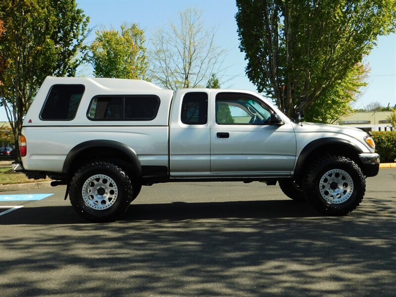 2003 Toyota Tacoma 2dr Xtracab 4X4 / 5-SPEED / LOW LOW MILES / LIFTED   - Photo 4 - Portland, OR 97217