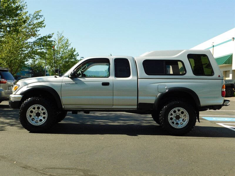 2003 Toyota Tacoma 2dr Xtracab 4X4 / 5-SPEED / LOW LOW MILES / LIFTED   - Photo 3 - Portland, OR 97217