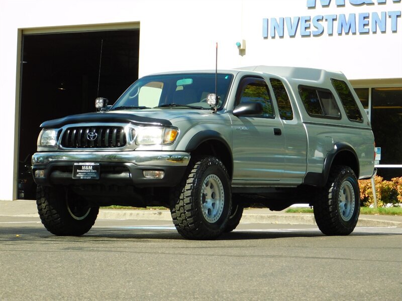 2003 Toyota Tacoma 2dr Xtracab 4X4 / 5-SPEED / LOW LOW MILES / LIFTED   - Photo 1 - Portland, OR 97217