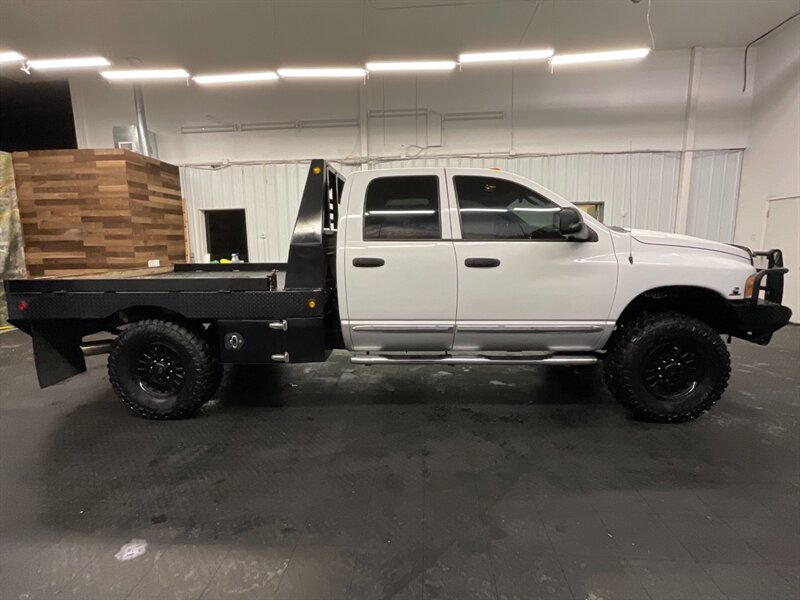 2004 Dodge Ram 3500 Laramie 4X4 / 5.9L DIESEL / 6-SPEED / FLAT BED  Leather & Heated Seats / LONG BED / BRAND NEW 35 " MUD TIRES / LOCAL TRUCK / RUST FREE - Photo 4 - Gladstone, OR 97027