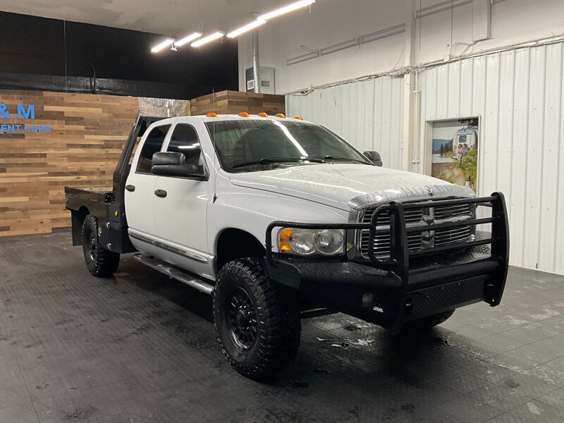 2004 Dodge Ram 3500 Laramie 4X4 / 5.9L DIESEL / 6-SPEED / FLAT BED  Leather & Heated Seats / LONG BED / BRAND NEW 35 " MUD TIRES / LOCAL TRUCK / RUST FREE - Photo 2 - Gladstone, OR 97027