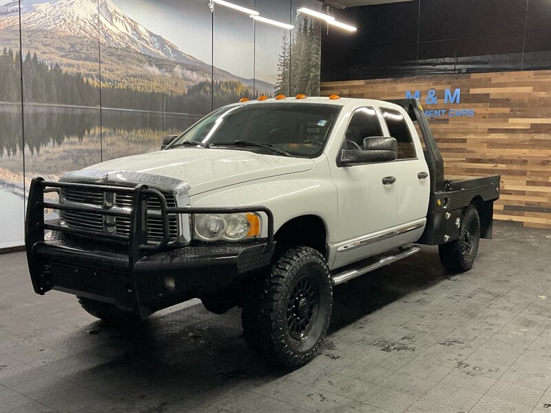 2004 Dodge Ram 3500 Laramie 4X4 / 5.9L DIESEL / 6-SPEED / FLAT BED  Leather & Heated Seats / LONG BED / BRAND NEW 35 " MUD TIRES / LOCAL TRUCK / RUST FREE - Photo 1 - Gladstone, OR 97027