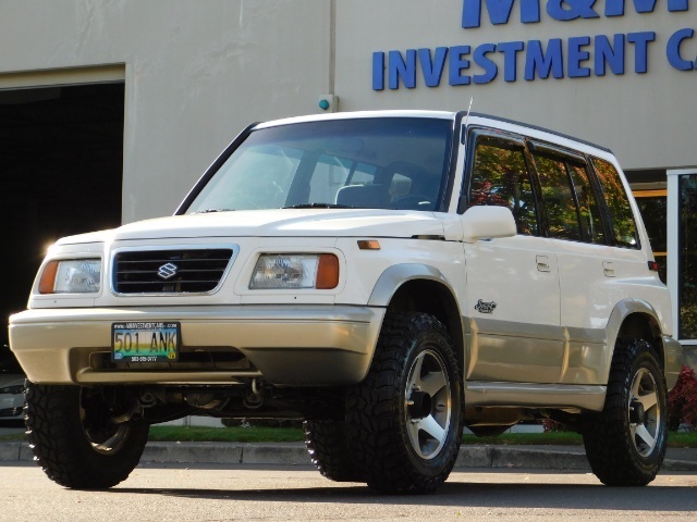 1997 Suzuki Sidekick Sport JLX 4dr 4WD 5Spd Manual 136K miles LIFTED   - Photo 1 - Portland, OR 97217