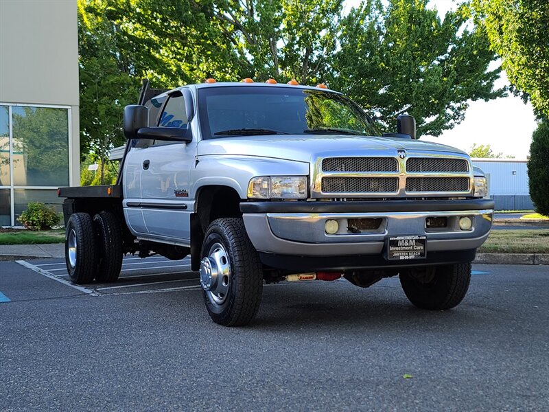 2002 Dodge Ram 3500 Dually FLAT BED 4X4 5.9L DIESEL / 1-TON / 151K MLS  / LONG BED / CUMMINS / LOW MILES - Photo 2 - Portland, OR 97217