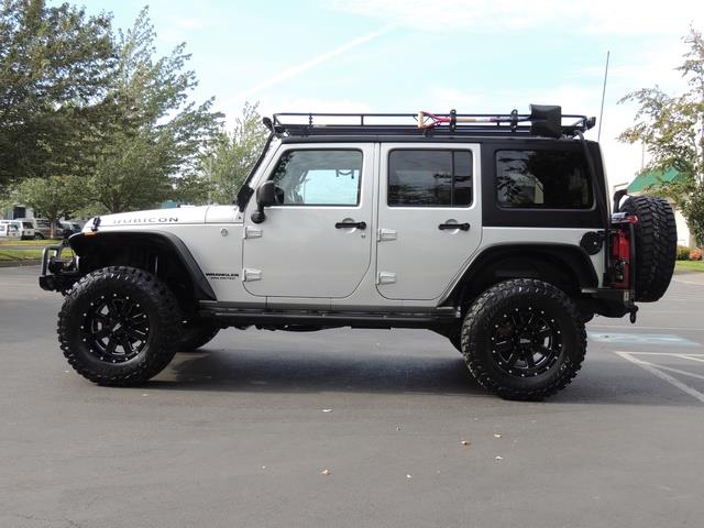 2012 Jeep Wrangler Unlimited Rubicon / 4X4 / NAVI  / LIFTED LIFTED   - Photo 3 - Portland, OR 97217