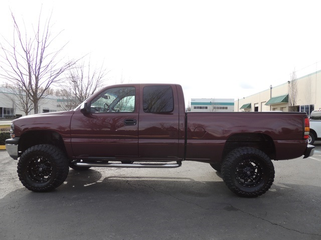 2001 Chevrolet Silverado 1500 LS / 4X4 / 4-Door Extended Cab/ LIFTED LIFTED   - Photo 3 - Portland, OR 97217
