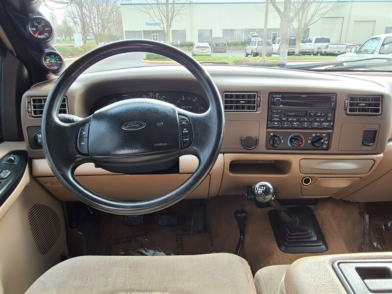 1999 Ford F-350 Super Duty / FLAT BED / Crew Cab / 4X4 / 7.3L /  Powerstroke TURBO DIESEL / 6 SPEED MANUAL / 1-TON / LIFTED - Photo 32 - Portland, OR 97217