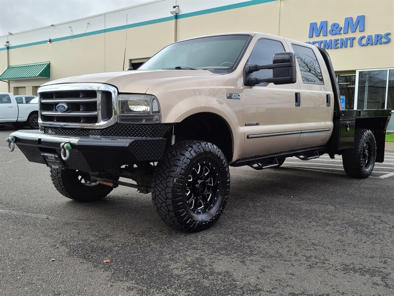 1999 Ford F-350 Super Duty / FLAT BED / Crew Cab / 4X4 / 7.3L /  Powerstroke TURBO DIESEL / 6 SPEED MANUAL / 1-TON / LIFTED - Photo 61 - Portland, OR 97217