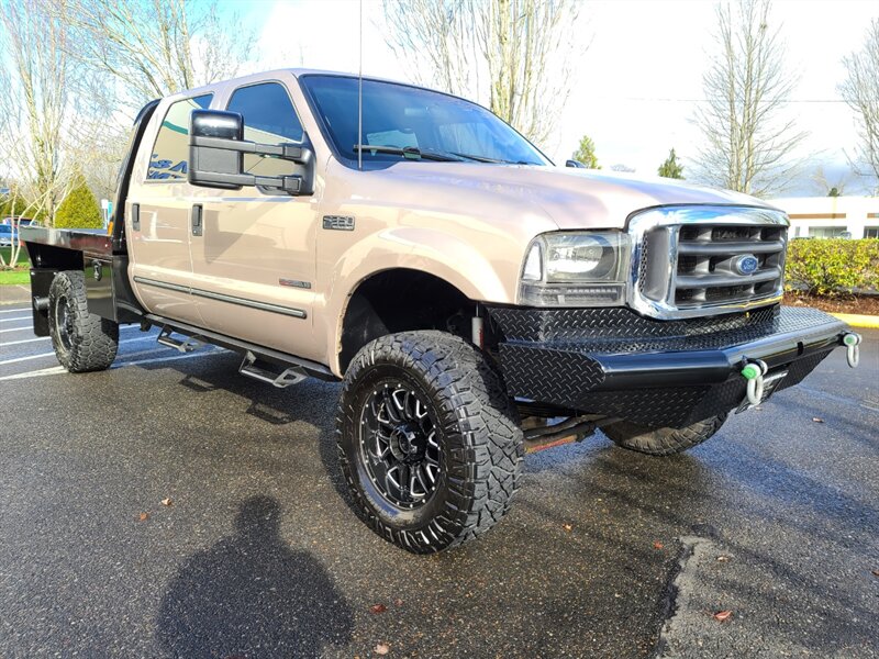 1999 Ford F-350 Super Duty / FLAT BED / Crew Cab / 4X4 / 7.3L /  Powerstroke TURBO DIESEL / 6 SPEED MANUAL / 1-TON / LIFTED - Photo 2 - Portland, OR 97217