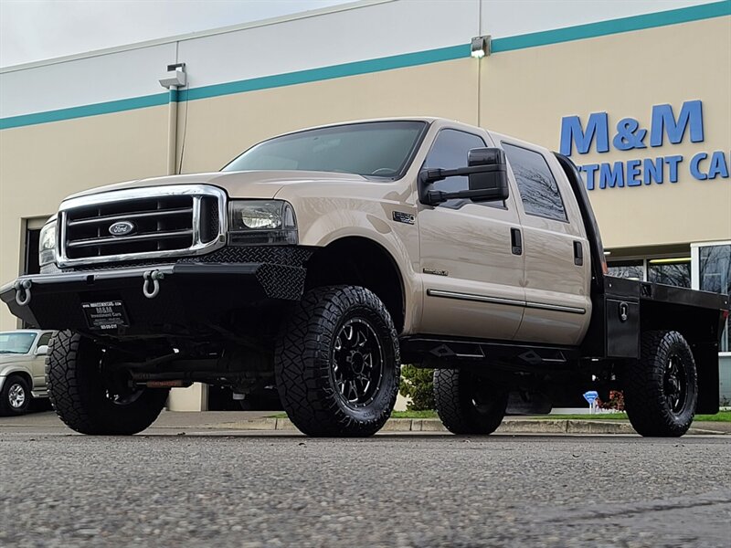 1999 Ford F-350 Super Duty / FLAT BED / Crew Cab / 4X4 / 7.3L /  Powerstroke TURBO DIESEL / 6 SPEED MANUAL / 1-TON / LIFTED - Photo 63 - Portland, OR 97217