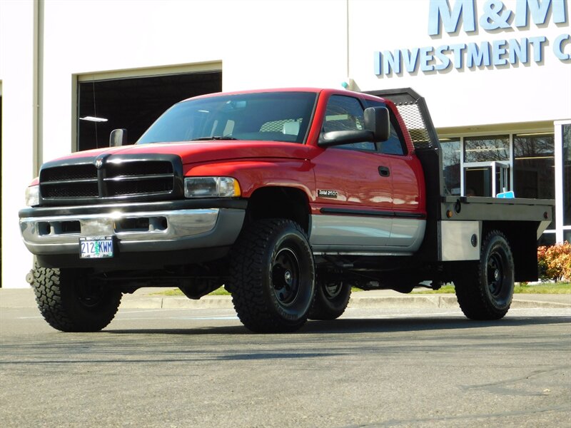 1999 Dodge Ram 2500 Laramie FLAT BED / 4X4 / 5.9L CUMMINS DIESEL   - Photo 1 - Portland, OR 97217