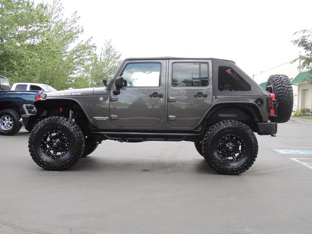 2014 Jeep Wrangler Unlimited Rubicon /4X4/ 6-SPEED / LIFTED / 1-OWNER   - Photo 3 - Portland, OR 97217