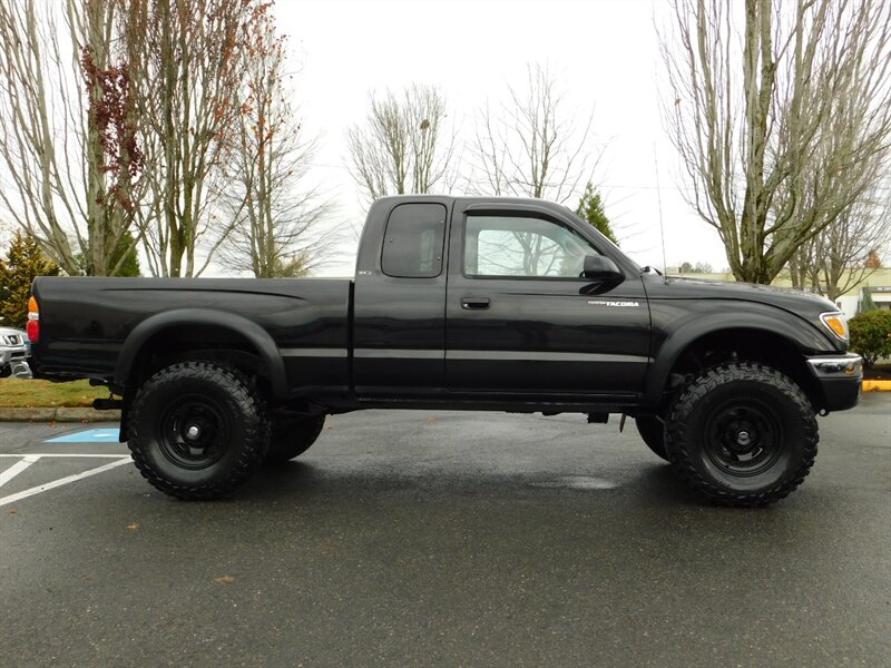 2002 Toyota Tacoma 2dr Xtracab 4X4 / 5-SPEED / LIFTED LIFTED   - Photo 4 - Portland, OR 97217