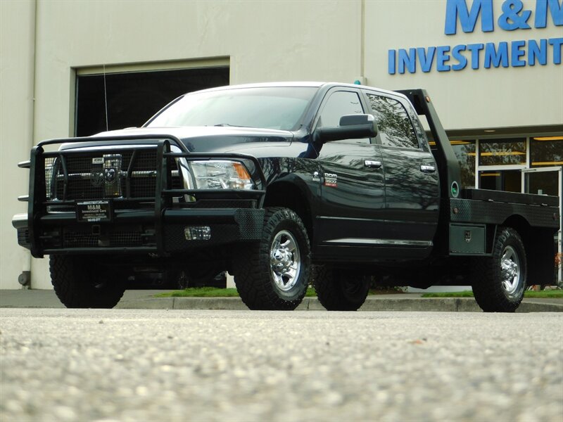 2012 RAM 3500 Outdoorsman 4X4 6.7L CUMMMINS DIESEL 6-SPD FLATBED   - Photo 1 - Portland, OR 97217