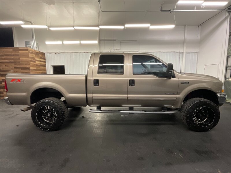 2003 Ford F-250 Lariat FX4 4X4 / 7.3L DIESEL /LIFTED / 94,000 MILE  LOCAL OREGON TRUCK / RUST FREE / LEATHER / LIFTED w/ 35 " MUD GRAPPLER & 20 " WHEELS / SHARP & CLEAN !! - Photo 4 - Gladstone, OR 97027