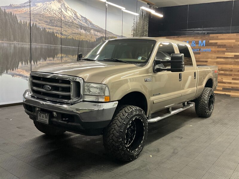 2003 Ford F-250 Lariat FX4 4X4 / 7.3L DIESEL /LIFTED / 94,000 MILE  LOCAL OREGON TRUCK / RUST FREE / LEATHER / LIFTED w/ 35 " MUD GRAPPLER & 20 " WHEELS / SHARP & CLEAN !! - Photo 1 - Gladstone, OR 97027