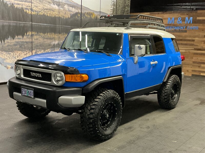 2007 Toyota FJ Cruiser 4X4 / 6-SPEED / LIFTED / Voodoo Blue  LOW MILES / NEW TIRES / RR DIFF LOCKS / RUST FREE / CLEAN SHARP - Photo 1 - Gladstone, OR 97027