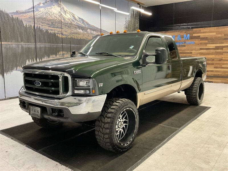 1999 Ford F-250 Lariat 4Dr Extended Cab 4X4 / 7.3L DIESEL / LIFTED / BRAND NEW 35 " MUD TIRES & 22 " WHEELS / Leather / LONG BED / LOCAL TRUCK / RUST FREE - Photo 1 - Gladstone, OR 97027