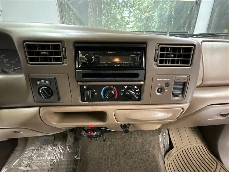 1999 Ford F-250 Lariat 4Dr Extended Cab 4X4 / 7.3L DIESEL / LIFTED / BRAND NEW 35 " MUD TIRES & 22 " WHEELS / Leather / LONG BED / LOCAL TRUCK / RUST FREE - Photo 19 - Gladstone, OR 97027