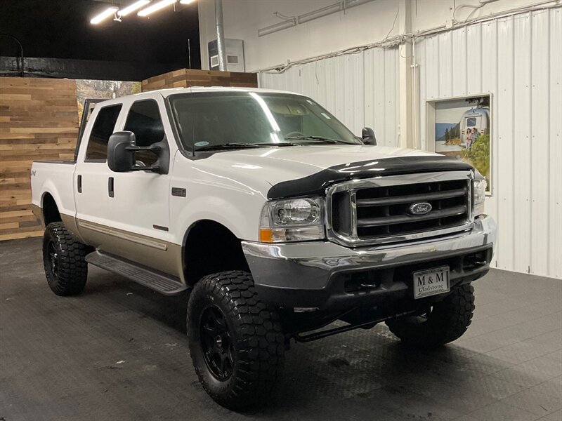 2000 Ford F-350 Super Duty 4dr Crew Cab Lariat 4X4 / 7.3L DIESEL / LIFTED  1-TON / RUST FREE / Leather Seats /LIFTED w/ 35 " MUD TIRES & 18 " WHEELS / 151,000 MILES - Photo 2 - Gladstone, OR 97027