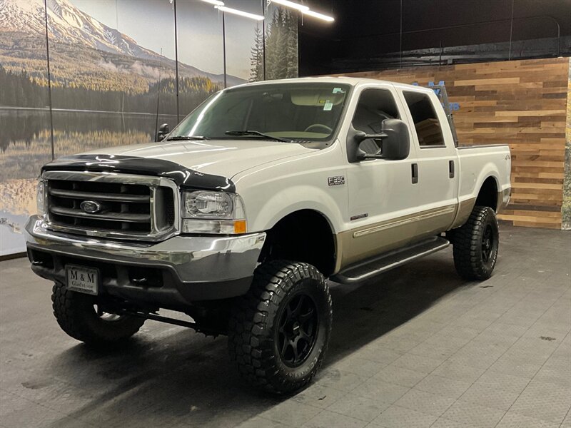 2000 Ford F-350 Super Duty 4dr Crew Cab Lariat 4X4 / 7.3L DIESEL / LIFTED  1-TON / RUST FREE / Leather Seats /LIFTED w/ 35 " MUD TIRES & 18 " WHEELS / 151,000 MILES - Photo 1 - Gladstone, OR 97027