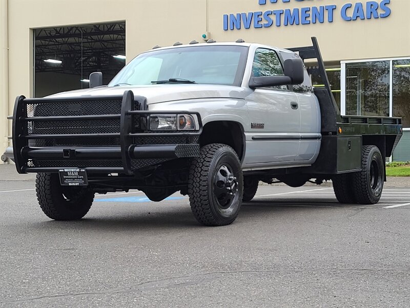 2000 Dodge Ram 3500 Dually FLAT BED / 4X4 / Laramie / 5.9L CUMMINS  Turbo DIESEL / LOW MILES / 1-TON - Photo 1 - Portland, OR 97217