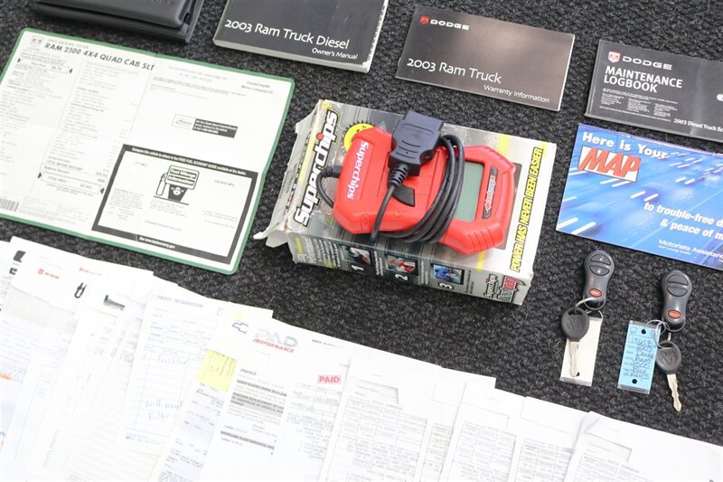 2003 Dodge Ram 2500 SLT 4dr Quad Cab  1-OWNER* 100% RUST FREE* SHORT BED HIGH OUTPUT CUMMINS 5.9L* 6-SPEED MANUAL* LEATHER* REAR AIRBAGS* BANKS EXAUST BRAKE* IN BED AUX FUEL TANK* ALL RECORDS SINCE NEW* WINDOW STICKER* 2-KEYS* 35 "NITTOs - Photo 63 - Portland, OR 97230