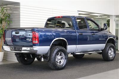 2003 Dodge Ram 2500 SLT 4dr Quad Cab  1-OWNER* 100% RUST FREE* SHORT BED HIGH OUTPUT CUMMINS 5.9L* 6-SPEED MANUAL* LEATHER* REAR AIRBAGS* BANKS EXAUST BRAKE* IN BED AUX FUEL TANK* ALL RECORDS SINCE NEW* WINDOW STICKER* 2-KEYS* 35 "NITTOs - Photo 7 - Portland, OR 97230