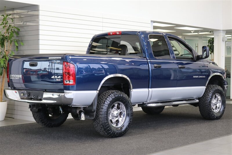 2003 Dodge Ram 2500 SLT 4dr Quad Cab  1-OWNER* 100% RUST FREE* SHORT BED HIGH OUTPUT CUMMINS 5.9L* 6-SPEED MANUAL* LEATHER* REAR AIRBAGS* BANKS EXAUST BRAKE* IN BED AUX FUEL TANK* ALL RECORDS SINCE NEW* WINDOW STICKER* 2-KEYS* 35 "NITTOs - Photo 7 - Portland, OR 97230