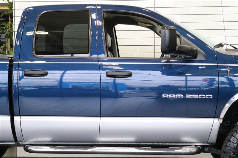 2003 Dodge Ram 2500 SLT 4dr Quad Cab  1-OWNER* 100% RUST FREE* SHORT BED HIGH OUTPUT CUMMINS 5.9L* 6-SPEED MANUAL* LEATHER* REAR AIRBAGS* BANKS EXAUST BRAKE* IN BED AUX FUEL TANK* ALL RECORDS SINCE NEW* WINDOW STICKER* 2-KEYS* 35 "NITTOs - Photo 57 - Portland, OR 97230