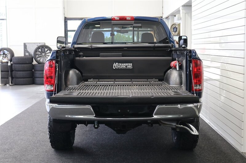 2003 Dodge Ram 2500 SLT 4dr Quad Cab  1-OWNER* 100% RUST FREE* SHORT BED HIGH OUTPUT CUMMINS 5.9L* 6-SPEED MANUAL* LEATHER* REAR AIRBAGS* BANKS EXAUST BRAKE* IN BED AUX FUEL TANK* ALL RECORDS SINCE NEW* WINDOW STICKER* 2-KEYS* 35 "NITTOs - Photo 15 - Portland, OR 97230